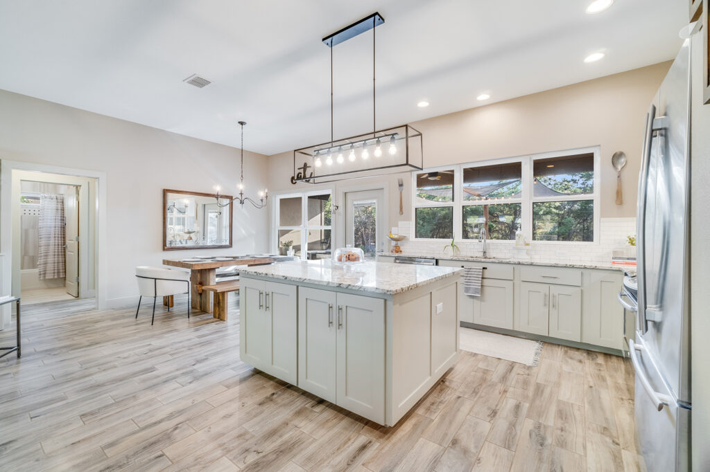 Vinyl Floors in a large open space living leading to the kitchen by Carpet to Go in Bellevue WA